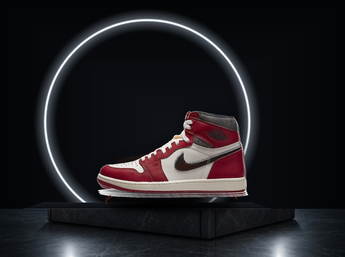 Air Jordan 1 High OG Lost & Found on a black podium